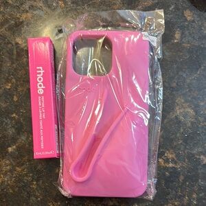 RHODE Vibrant Pink iPhone 15 pro max with matching lip gloss.